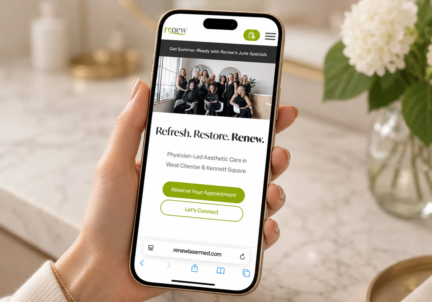 Renew Laser & Aesthetic Medicine mobile website shown on a phone