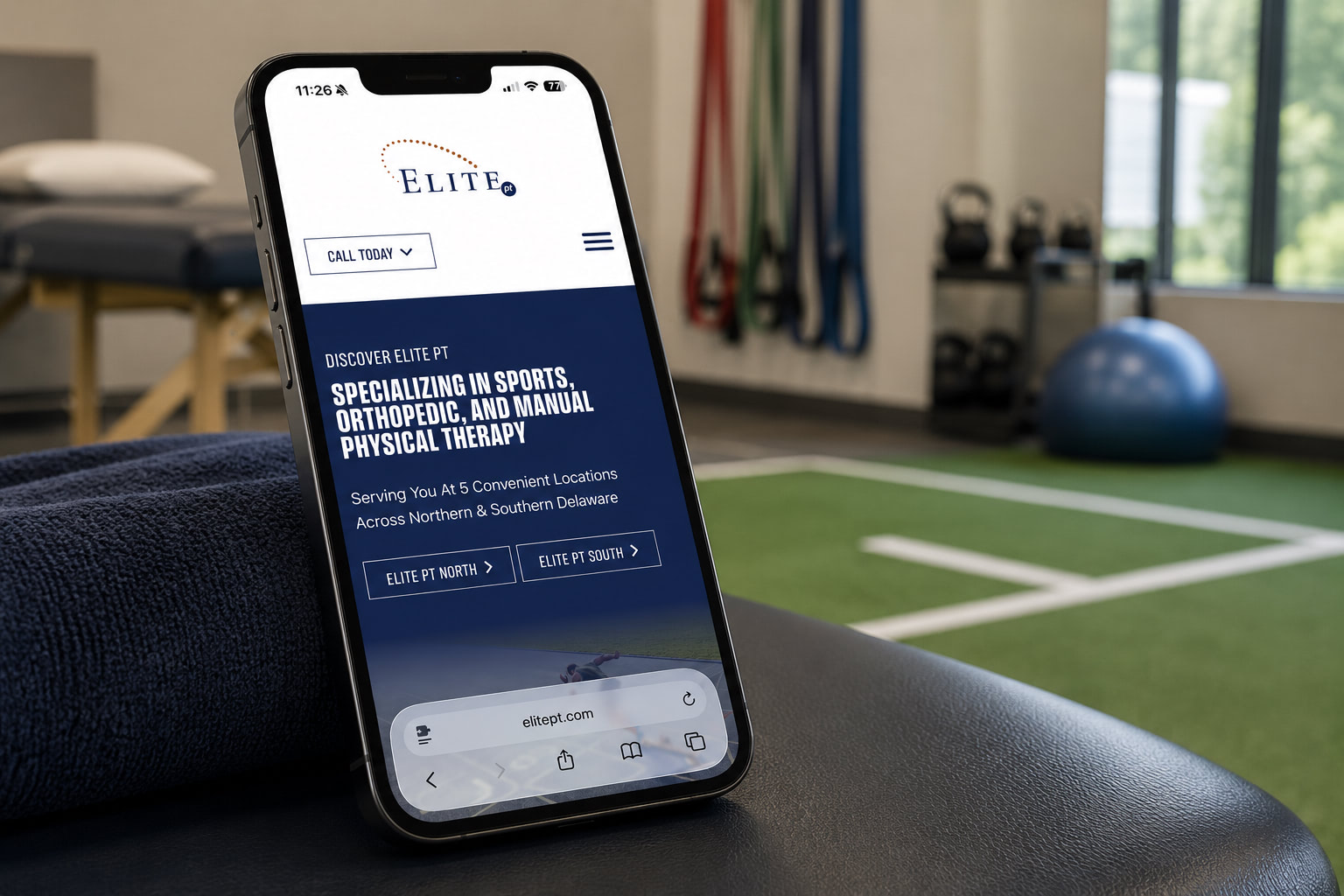 Elite PT mobile website mockup in a physical therapy clinic in Wilmington, Delaware